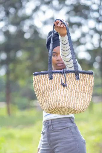 Size 10 Kiondo with neutral colours.